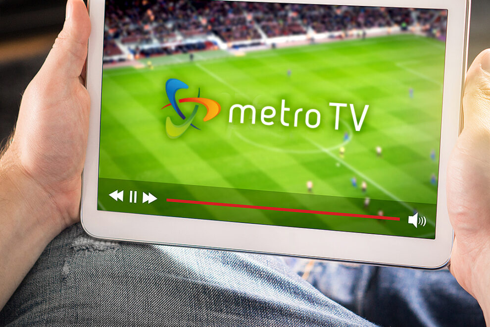 Man watching sports on tablet. Football and soccer game live str